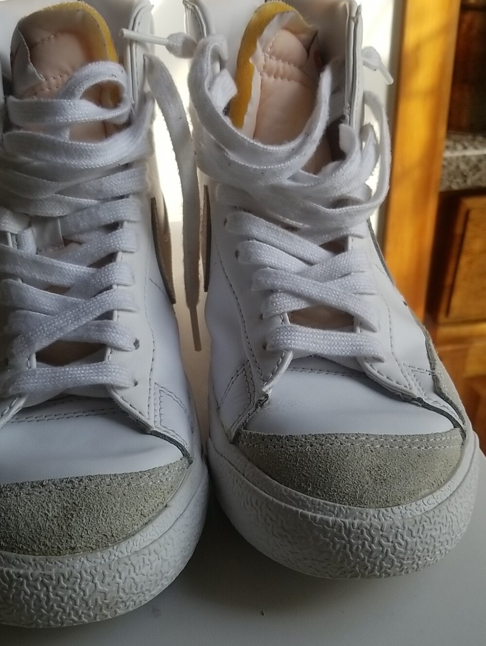 Nike White High-Top Sneakers with Light Gray Suede Toe
